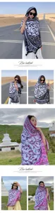 Ethnic style sunscreen scarf and shawl detail showing exquisite floral print and tassels for women.