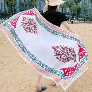 Ethnic print beach towel and summer sun protection shawl for women vacation travel outerwear.
