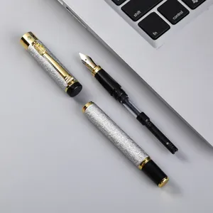 Chinese style dragon fountain pen business gift set with textured barrel and ink converter.