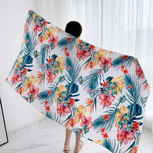 Tropical floral print beach shawl and stylish sun protection scarf for women, perfect holiday.