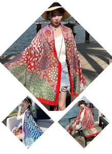 Detailed showcase of the ethnic style printed cotton linen shawl worn by model near the sea.