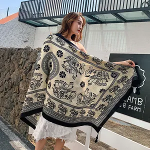 Detailed view of the ethnic style elephant print shawl, perfect for travel and beach photos.