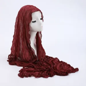 Burgundy crinkled lace hijab scarf detail view, lightweight summer sun protection shawl drape.