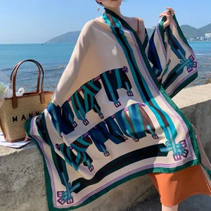 Elegante foulard stampato stile resort donna sciarpa copriscialle protezione solare.