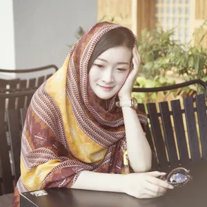 Ethnic print cotton linen scarf shawl for women, stylish travel sun protection accessory detail.