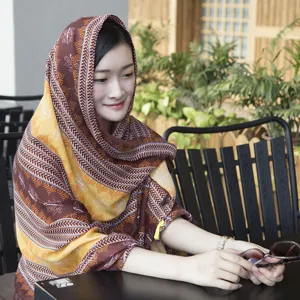 Ethnic style printed cotton linen scarf shawl with tassels, perfect for travel and daily wear.