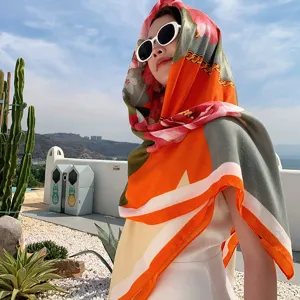 Stylish 130cm floral square scarf for women, versatile neckerchief and elegant resort shawl.