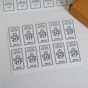 Set di adesivi di ringraziamento minimalisti con fiori per confezioni regalo e sigilli.