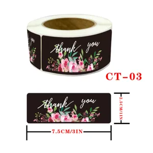 Roll of black thank you floral stickers, 7.5x2.5cm sealing labels for orders and packaging.