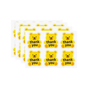 Adorables autocollants ours jaune de remerciement pour emballage et décoration de pâtisserie.
