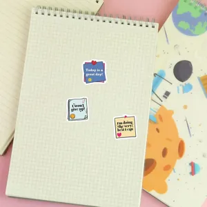 Inspirational sticky notes detail shot, cute journal sticker close-up, planner deco