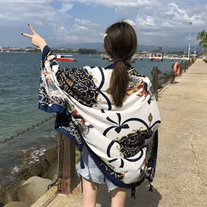 Summer beach shawl with chic chain print design, lightweight scarf for vacation sun protection.