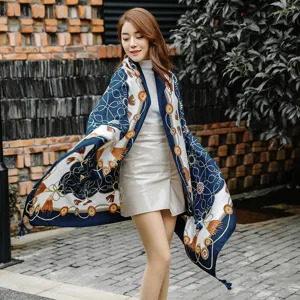 Detailed view of women vintage chain print silk scarf, elegant two-use shawl for all seasons.