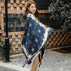 Detailed view of women retro chain print silk scarf shawl versatile travel fashion accessory.