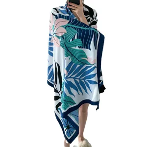 Tropical leaf print beach towel and stylish summer shawl scarf for women vacation wear