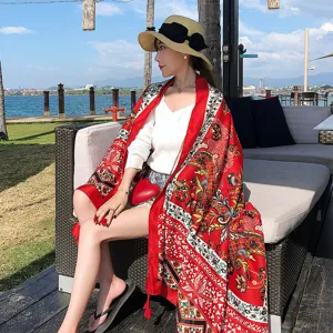 Red floral printed fashion shawl scarf detail view, elegant resort wear accessory for spring summer.