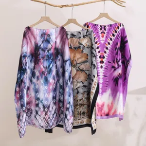 Detailed view of women's floral printed imitation silk sunscreen shawl, loose summer.