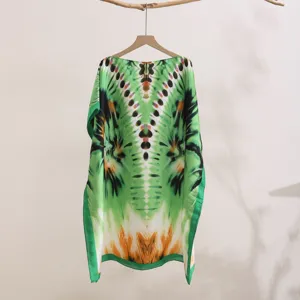 Green printed sun protection cape detail, loose summer shawl hanging display, fabric.