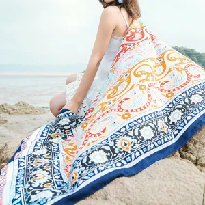Bohemian paisley beach scarf detail, colorful ethnic pattern shawl, versatile outdoor wrap.