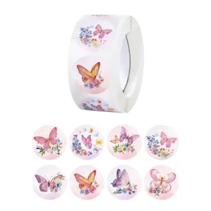 Roll of watercolor butterfly stickers, 1 inch round floral self-adhesive labels for gift packaging.