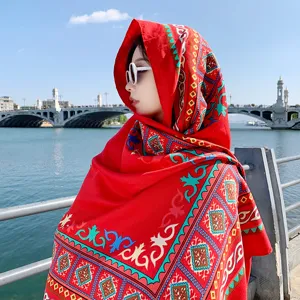 Ethnic style red oversized shawl scarf, perfect for beach sun protection and travel photography.