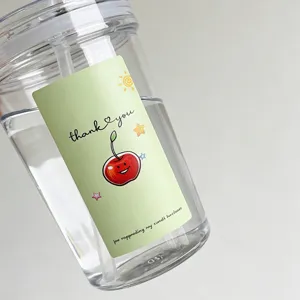 Clear plastic tumbler cup featuring cute cherry sticker and thank you text for daily use.