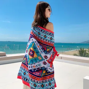 Colorful ethnic print beach shawl scene, lightweight summer travel scarf detail view.