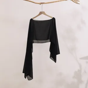 Detail of lightweight black summer sun protection shawl, breathable long sleeve shrug fabric.
