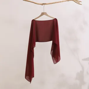 Detailed view of lightweight burgundy women summer long sleeve sun protection shawl cover up.