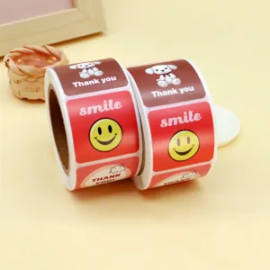 Detailed view of cute sticker rolls with thank you and smile designs, perfect for baking and gifts.
