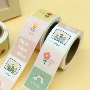 Cute floral and rainbow sticker rolls with thank you text, ideal for baking packaging and crafts.