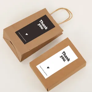 Ensemble sac cadeau et boîte en papier kraft avec autocollant de remerciement élégant emballage.