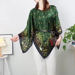 Green printed silk-like shawl top detail, elegant loose fit cape design for summer wear.