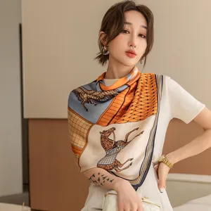 Elegant women's silk scarf featuring luxury equestrian carriage print, perfect for spring.