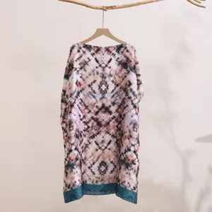 Detailed view of the summer print sun protection shawl, featuring loose fit and elegant hem design.