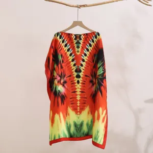 Detailed view of women summer colorful tie-dye printed sun protection shawl garment.