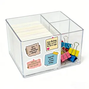 Boîte de rangement de bureau en acrylique transparent avec compartiments multiples.