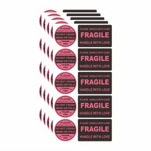 Fragile warning stickers labels roll for shipping and mailing packages safely and securely.