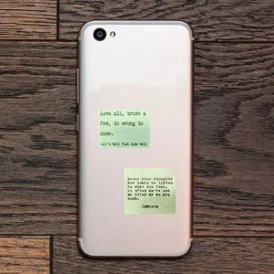 Detail view of English quote stickers featuring inspirational text designs on phone case.