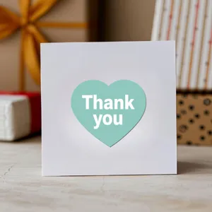 Heart-shaped thank you card sticker macaron green decor for gift wrapping envelope seal.