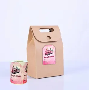 Christmas gift paper bag and festive decorative sticker set for holiday packaging and sealing.