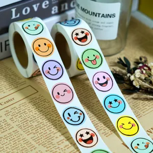 Colorful smiley face sticker rolls for gift packaging and daily DIY crafts detail.