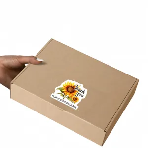 Handmade sunflower thank you stickers detail, ideal for small business gift bag packaging.