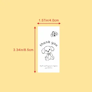 Detailed view of cute cartoon dog thank you sticker seal label, showing clear line art and text.