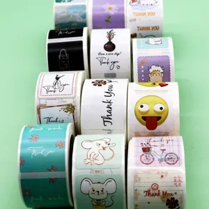 Decorative thank you sticker rolls, rectangular and square adhesive labels for gift box packaging.