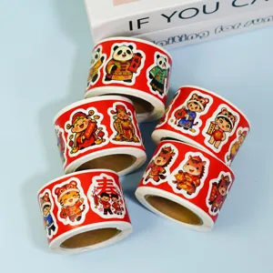 Chinese New Year sticker rolls featuring cute cartoon designs, festive red decorative labels.