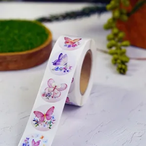 Detailed view of roll butterfly flower stickers, colorful floral adhesive label for decoration.