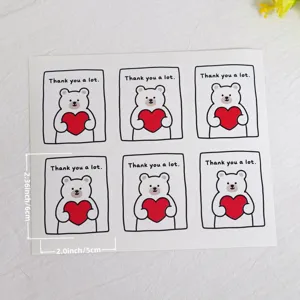 Simpatici adesivi con orsetto bianco di ringraziamento per confezioni regalo e sigillatura.