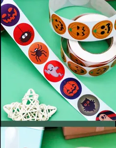 Halloween roll stickers detail shot featuring cute pumpkin, ghost and spider pattern designs.
