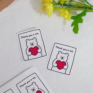 Simpatici adesivi con orsetto bianco di ringraziamento per regali e sigilli di panetteria.